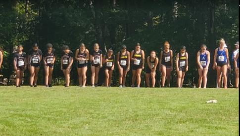 Girls cross country starting a race