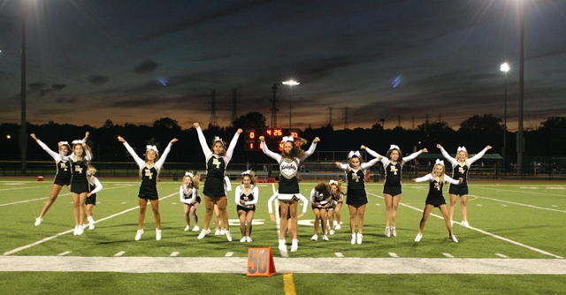 Cheerleaders on football field